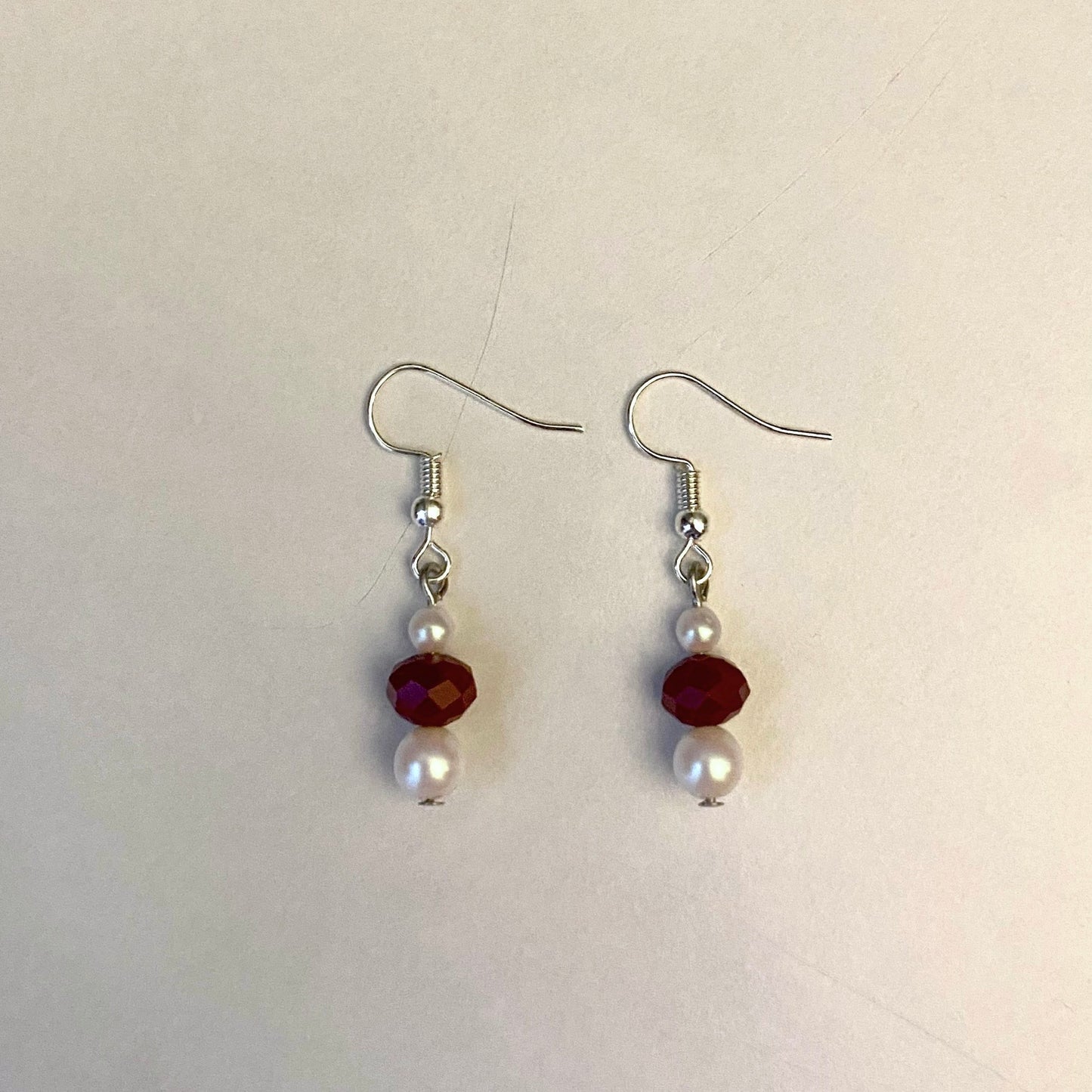 red pearl earrings